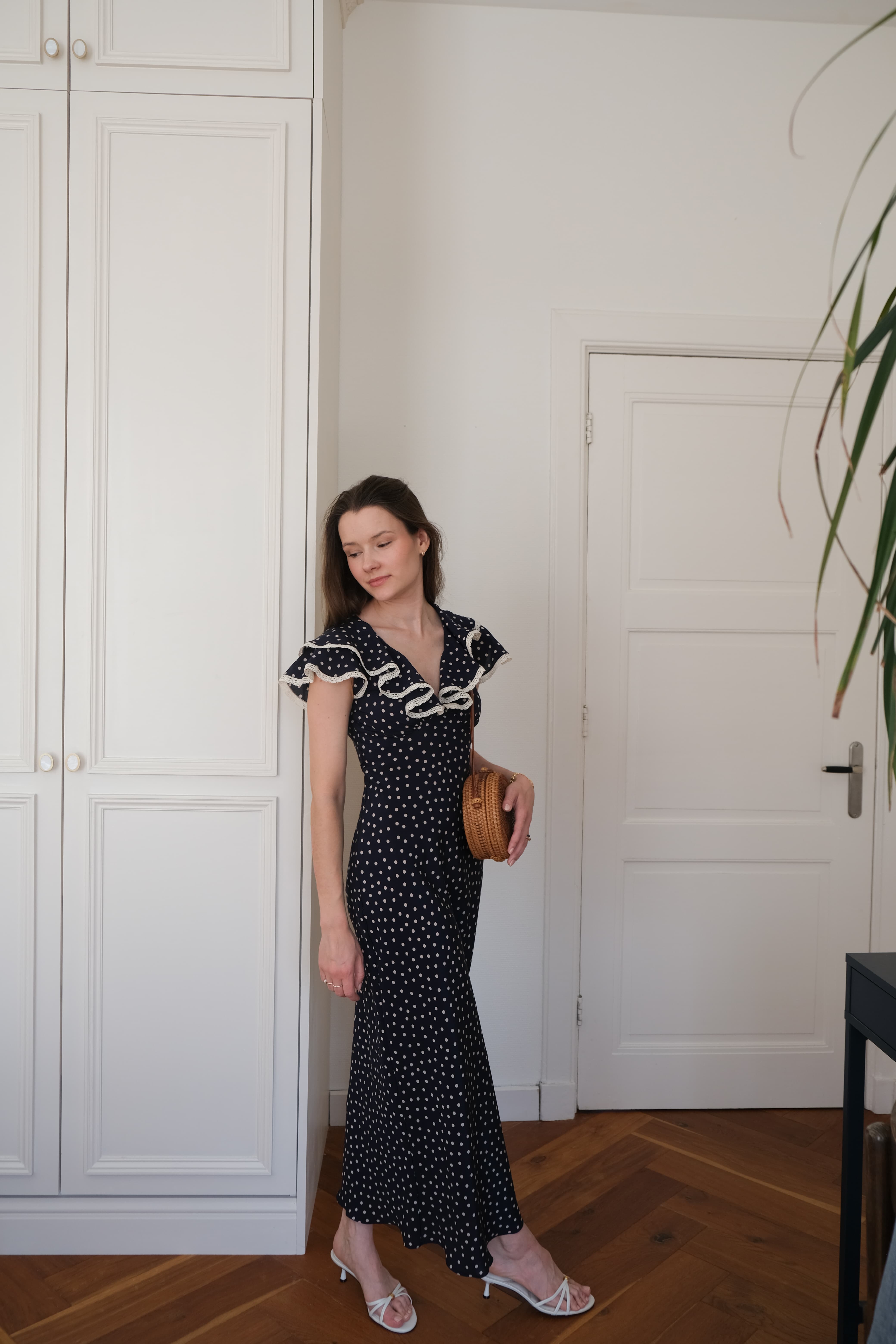 Viola – Ruffle Neck Midi dress worn, styled with a straw bag