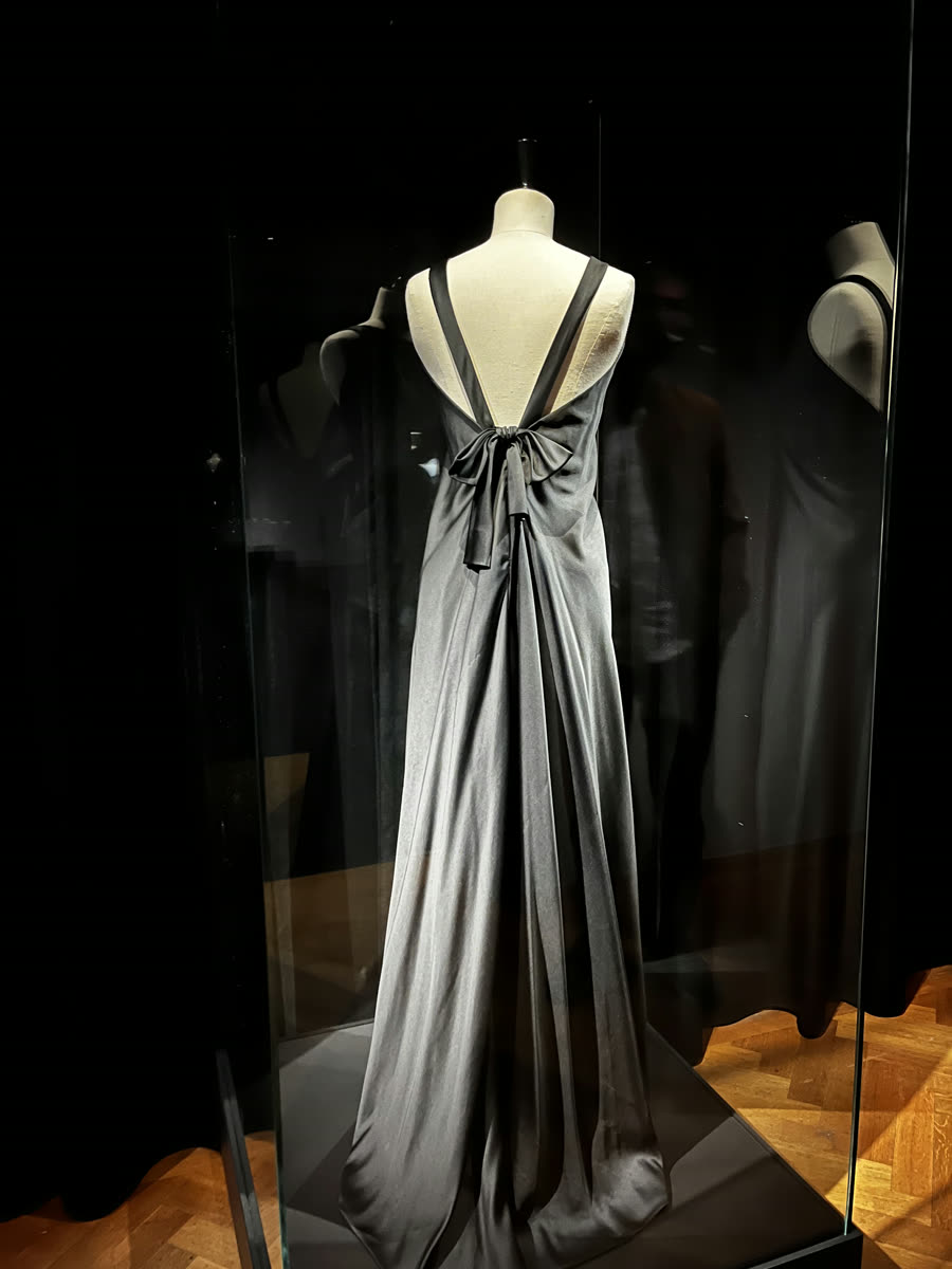Bias-cut satin evening gown on a mannequin